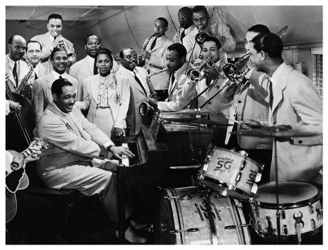 A group of people playing instruments

Description automatically generated