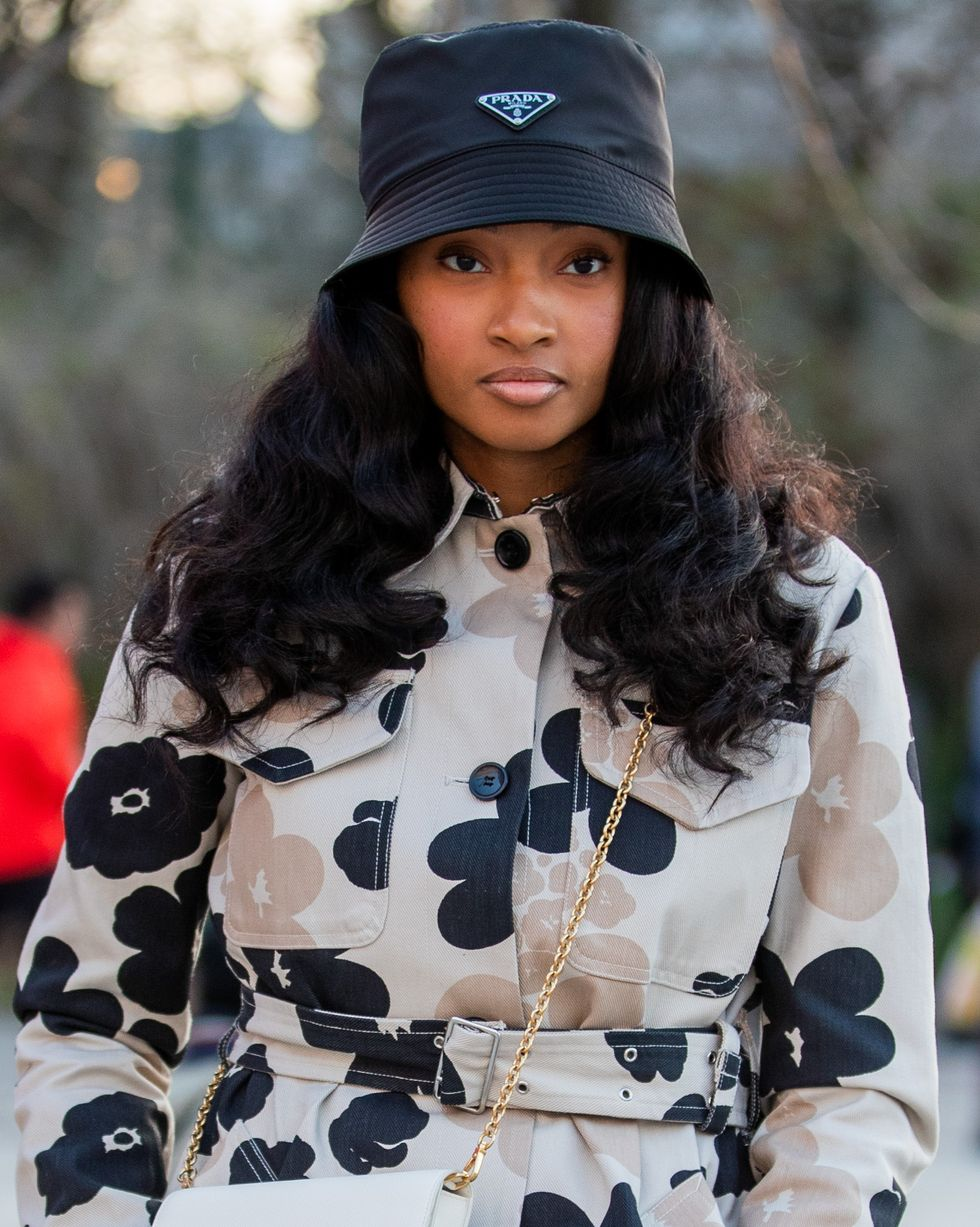 Types of Hat: Picture showing a girl looking gorgeous with her bucket hat