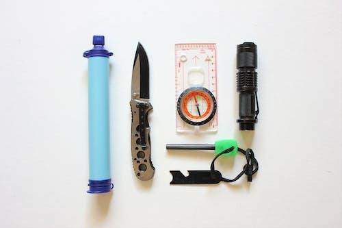 Free Survival Kit on White Background Stock Photo