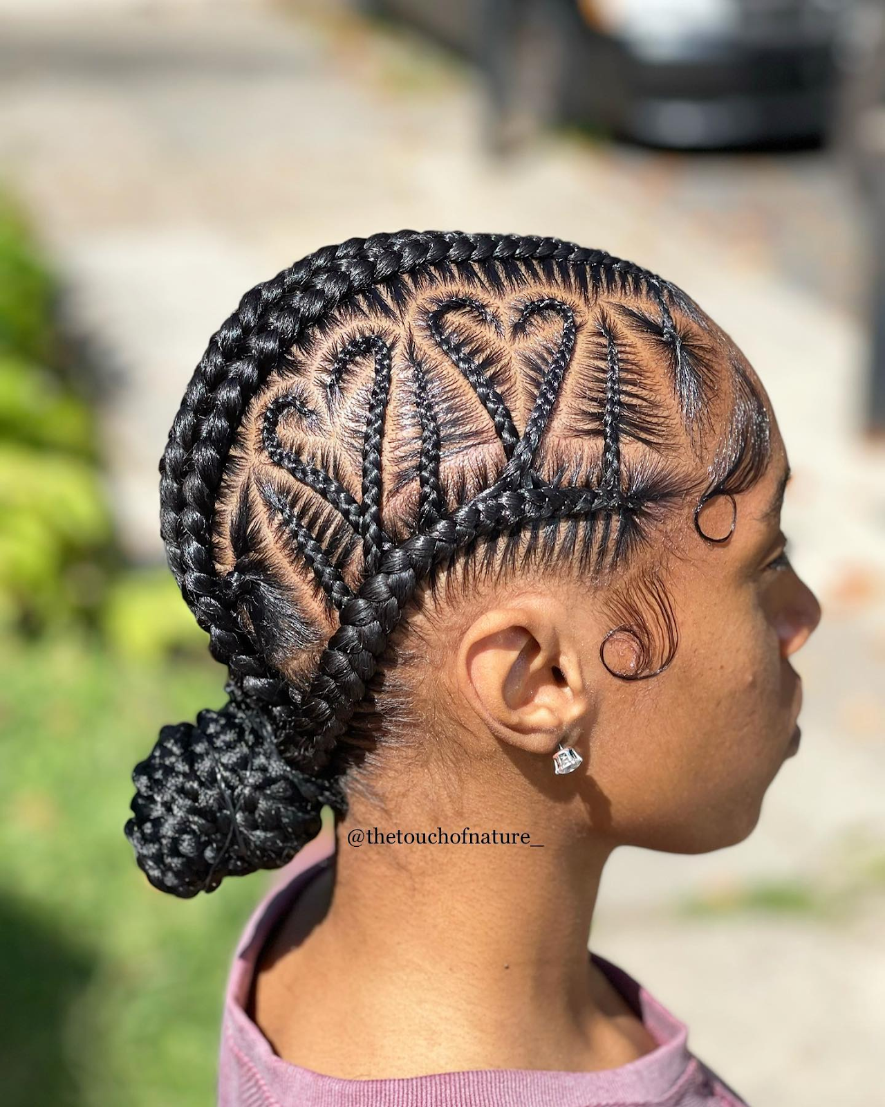  Hearts and Triangle Cornrow Bun Hairstyle