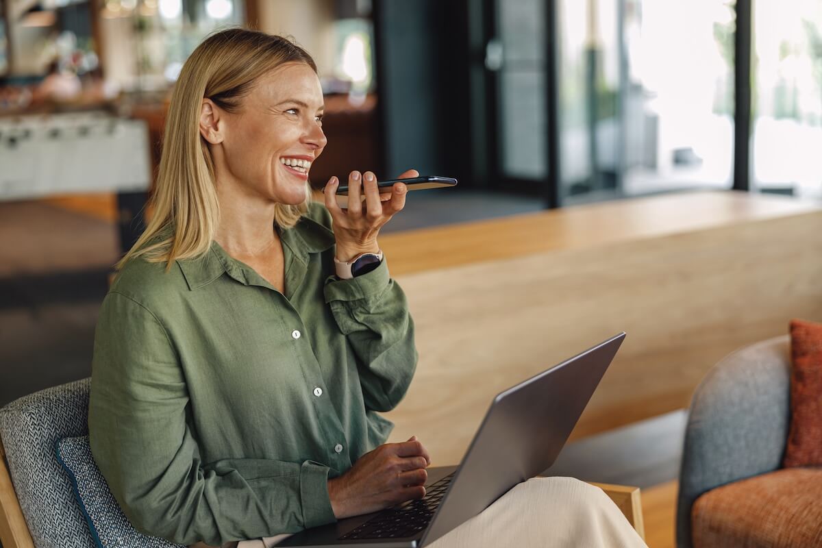 Woman happily talking on the phone