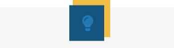 A blue light bulb on a yellow and blue square

Description automatically generated