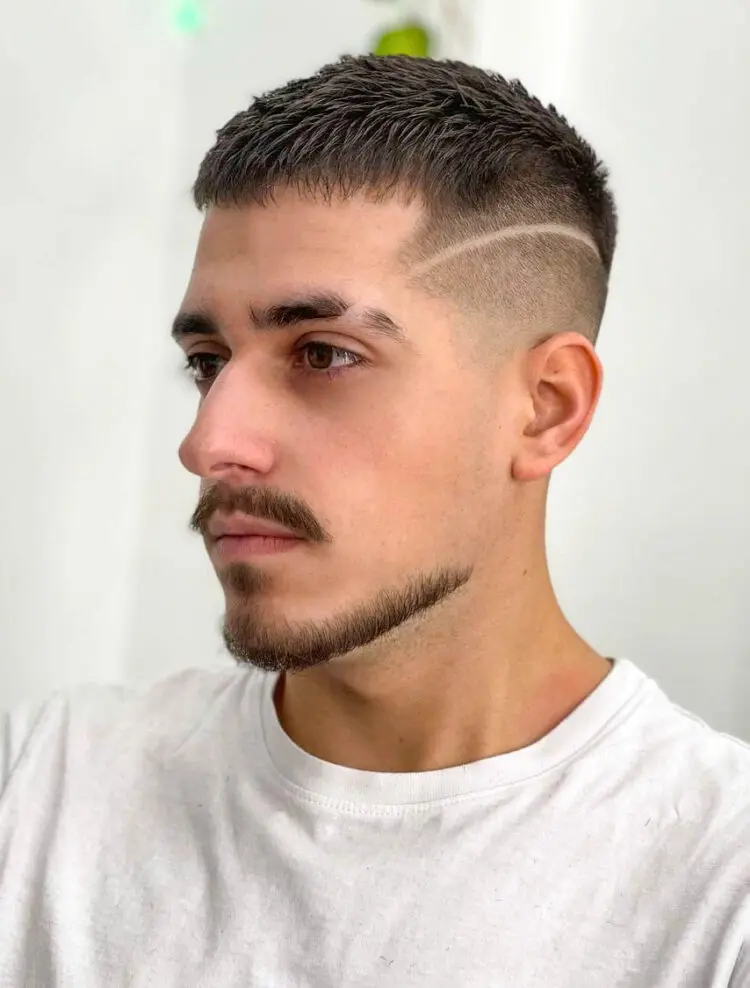 Picture of a guy showing off his haircut with a stylish line to add