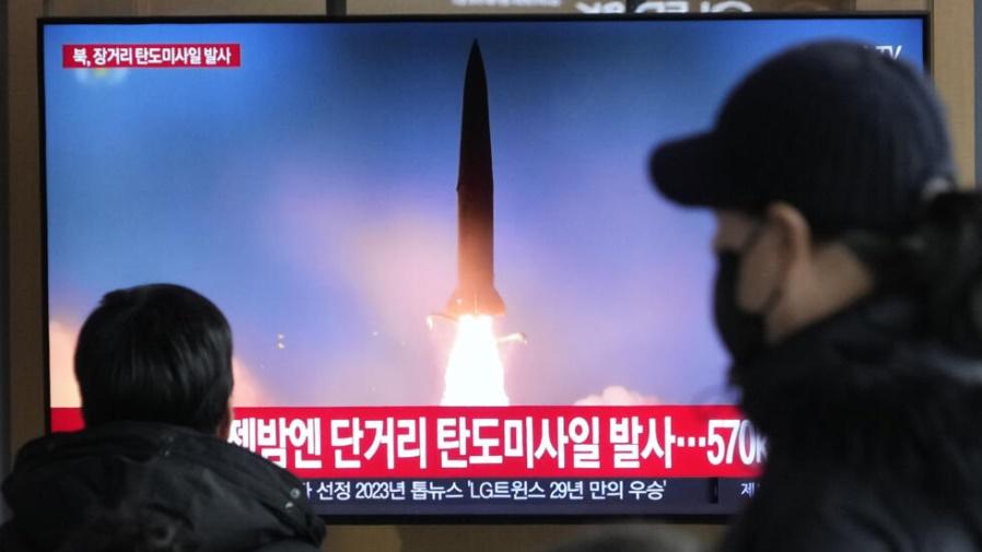 A TV screen shows a file image of North Korea's missile launch during a news program at the Seoul Railway Station in Seoul, South Korea, Monday, Dec. 18, 2023. North Korea fired an intercontinental ba