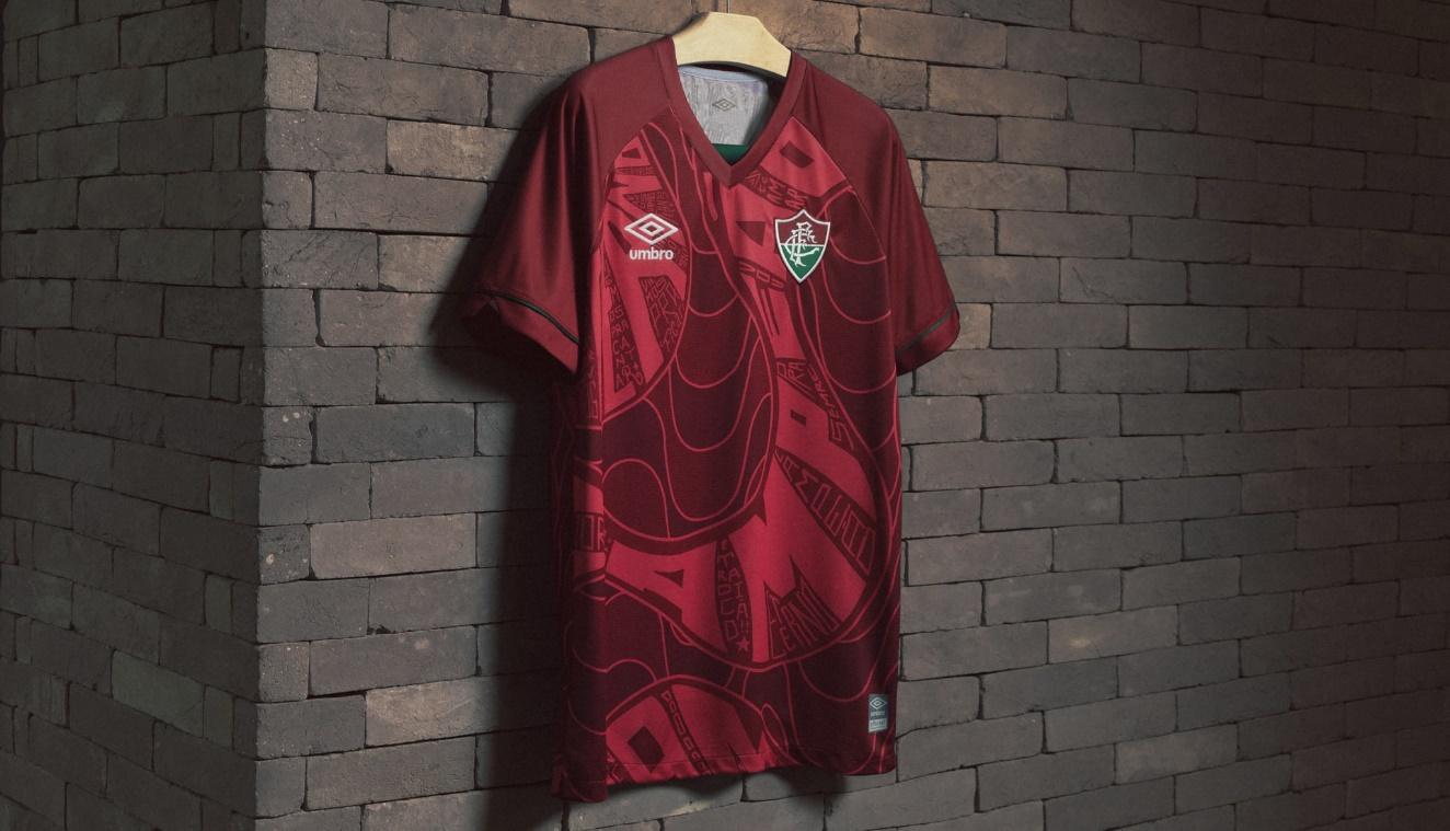 A red jersey on a brick wall

Description automatically generated