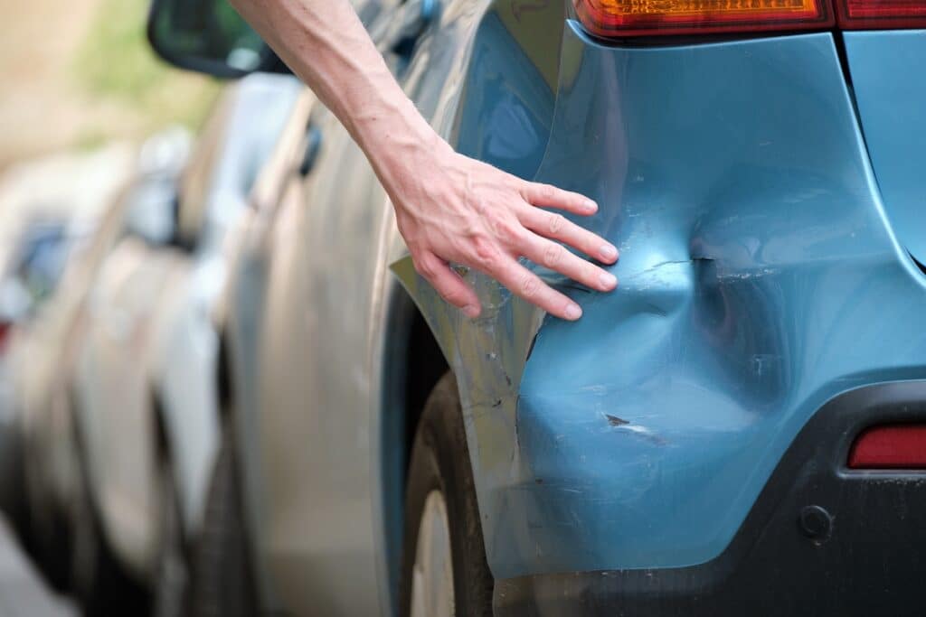 how to get a dent out of a car bumper