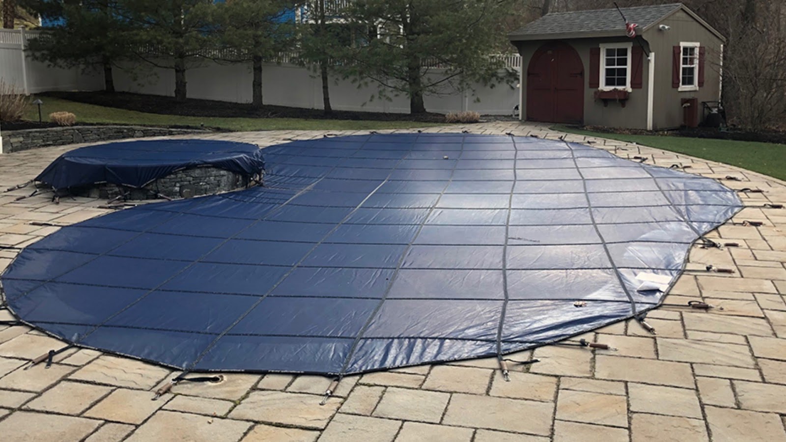 Securely Cover Your Pool for the Winter Season