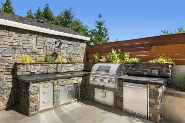 ways to make your outdoor living space your own kitchen with bbq grill and refrigerator custom built michigan