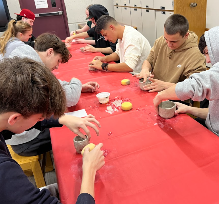 Students working on their pottery