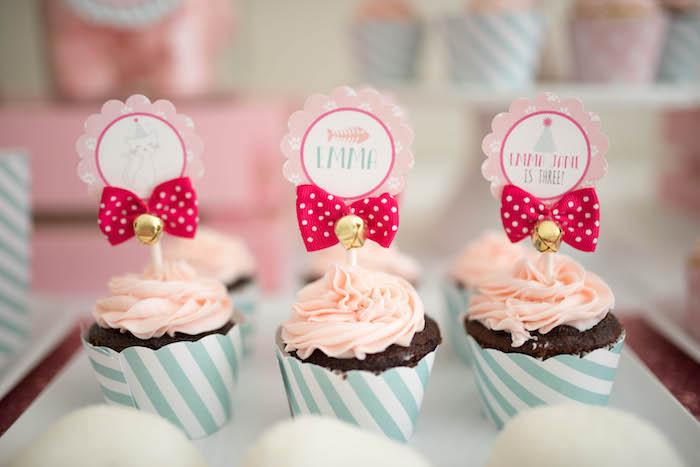 Cupcakes adorned with bows and bells from a Kitty Cat Birthday Party on Kara's Party Ideas | KarasPartyIdeas.com (24)