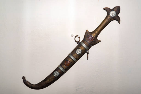 A visual representation of a warrior holding a sword