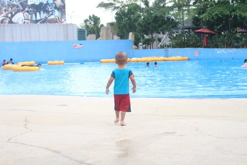 Unsupervised child approaching swimming pool