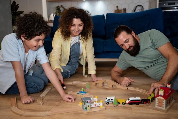 Close up on child playing with parents