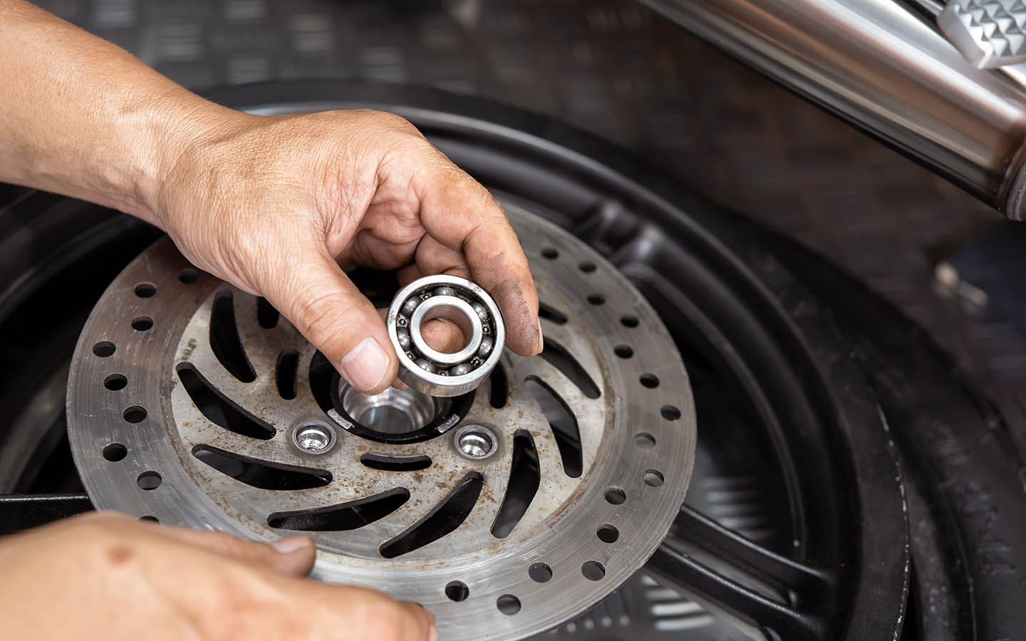  ensure the vehicle is parked on a flat surface to Change a Car's Wheel Bearing 