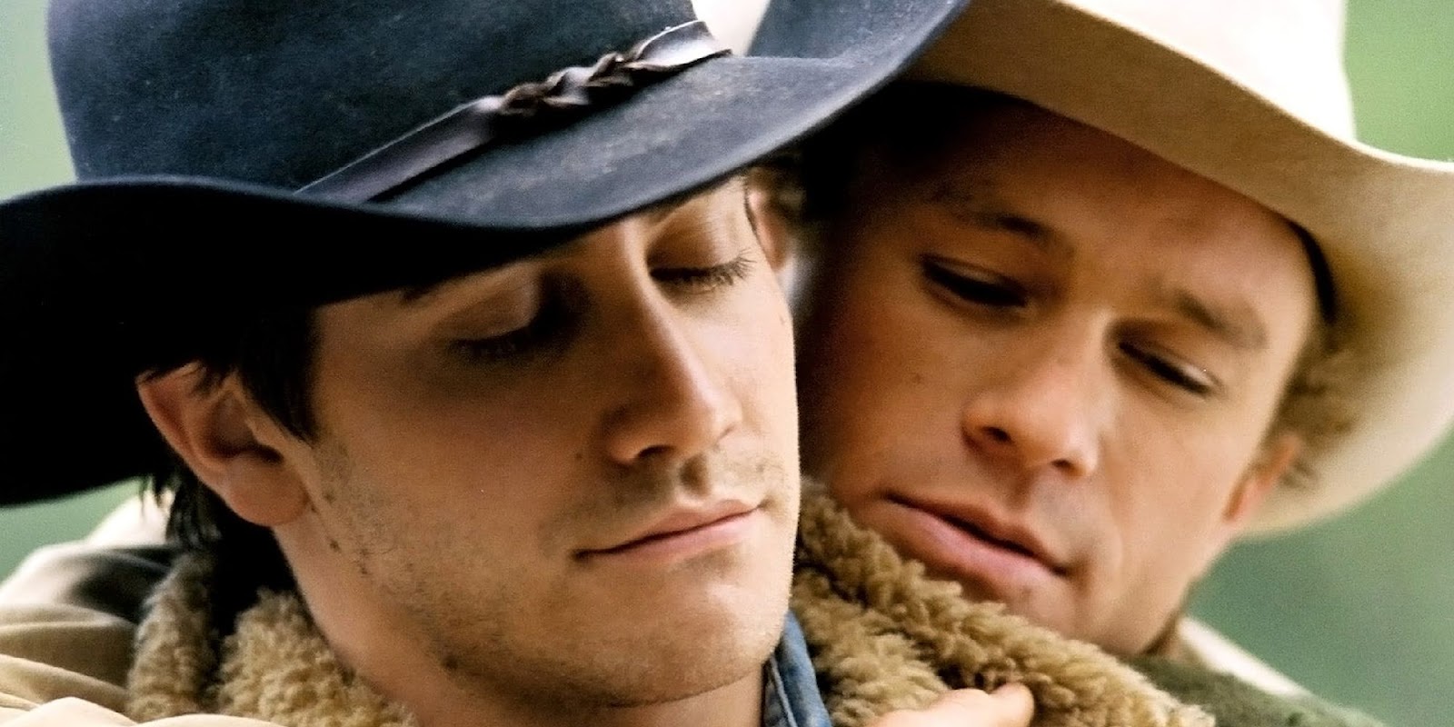 Jake Gyllenhaal and Heath Ledger hugging in 'Brokeback Mountain'