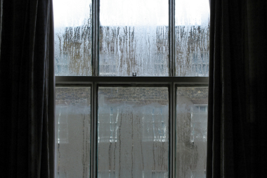 things to think about before replacing your windows rainy window with curtains custom built michigan