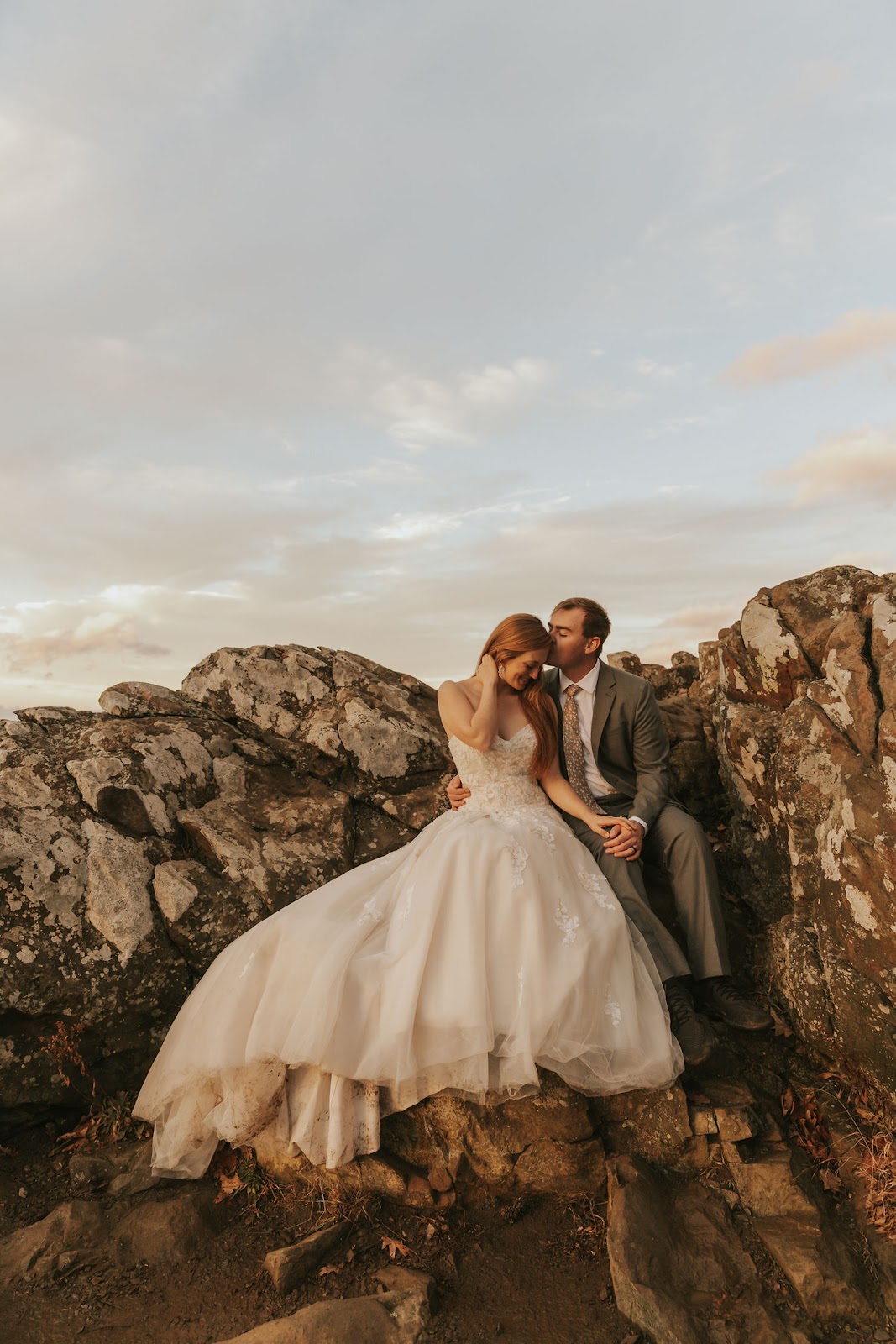 Bride and groom pose for wedding elopement portraits at Hawksbill Summit in Shenandoah National Park