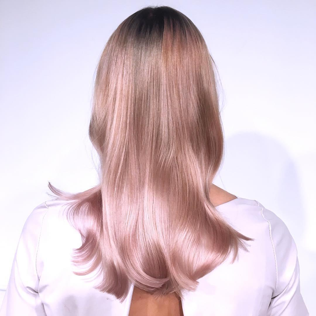 Hair Dye Ideas: back view of a lady with pastel hair color