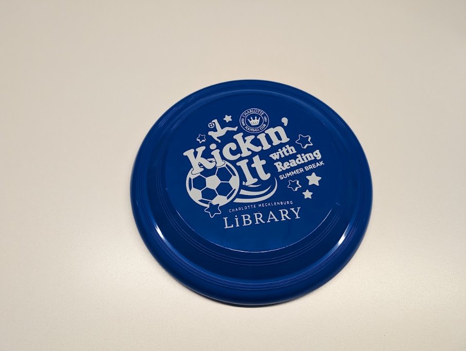 A blue frisbee with white text

Description automatically generated