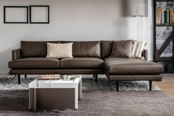 Brown leatherette L-shaped sofa with metal legs