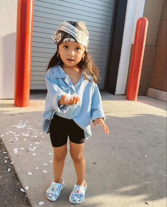 Picture  showing a toddler rocking the  footwear with jean jacket to match