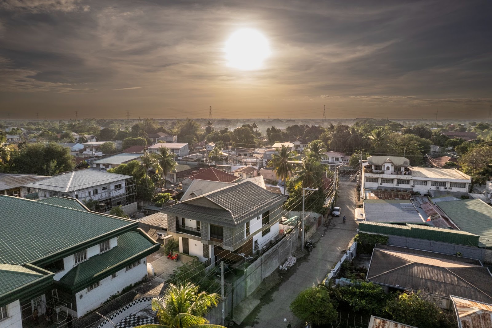 an aerial view of Tabing Bahay a modern bahay na bato in a provincial neighborhood.