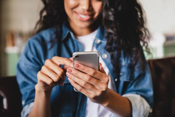 4,900+ African American Woman Sending Text Message On Cellphone Stock  Photos, Pictures & Royalty-Free Images - iStock