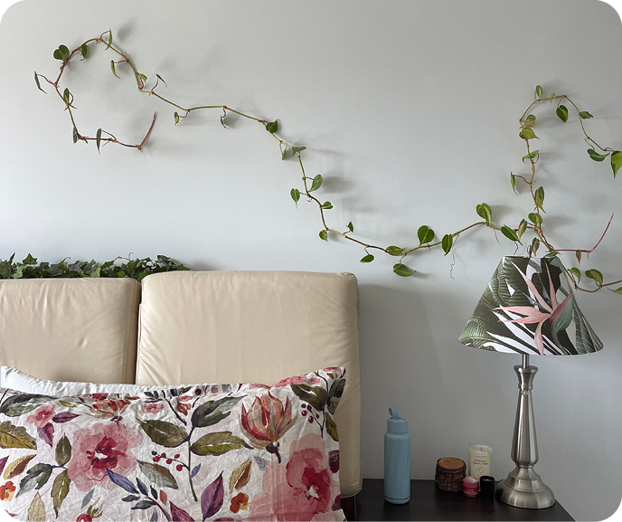 Our Botanical Marsala Pillow Shams shown on a bed.