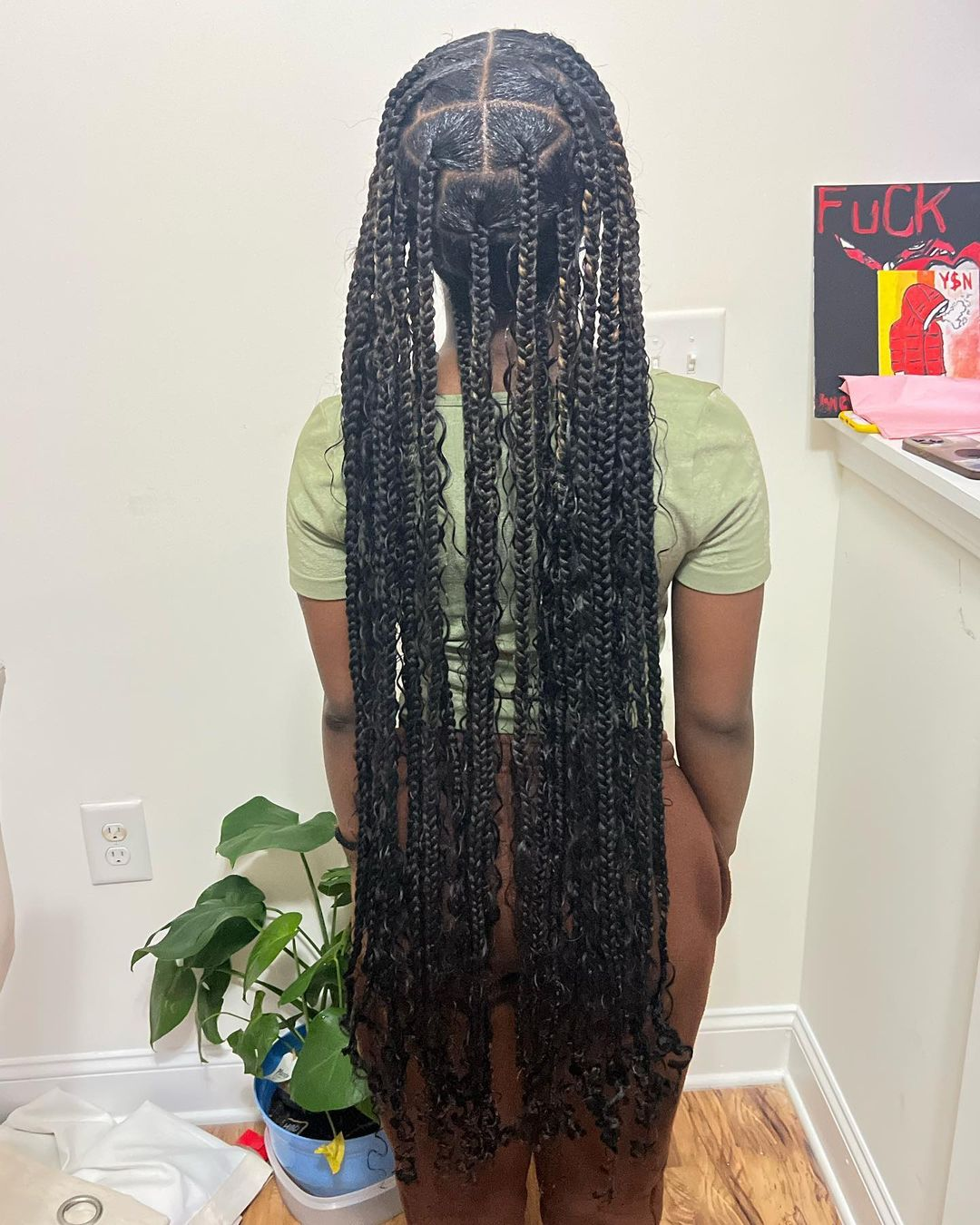Picture of a lady rocking the  boho knotless braids 