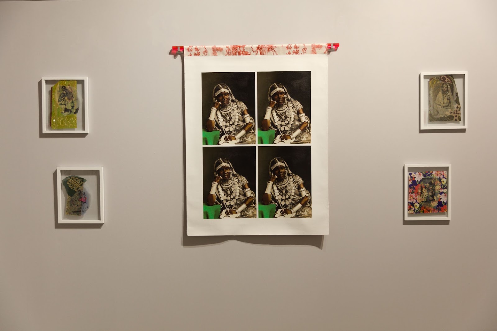 Image: Renluka Maharaj’s works: Amaya (2022) in the center, four copies of a vintage photograph with certain parts edited with ink and fabric. Clockwise around it in smaller frames are Myra (2022), Divya and Deepa (2022), Kavi with Little Anju (2022), and Fatima, Nadya and Layla (2022), all vintage photos in frames modified by acrylic paint and fabric, matted against a clear background. Courtesy: South Asia Institute.