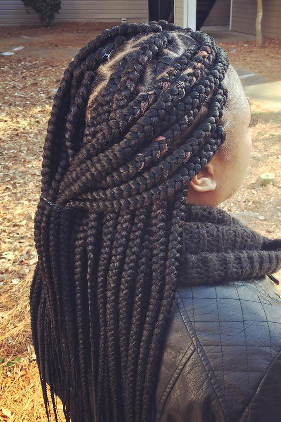 Back view of  a lady wearing the Jumbo Box Braids 