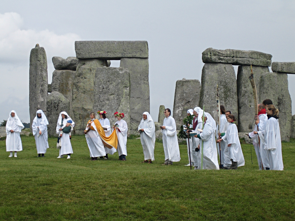 A group of druids take part in a ritual at Stonehenge. Devotional practices, including meditation, are a core part of Druidry.
