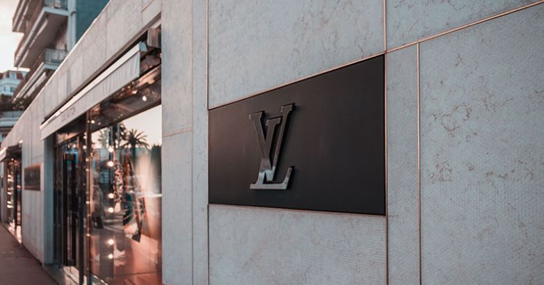 The entrance of the luxury Louis Vuitton store on a famous street in New York.