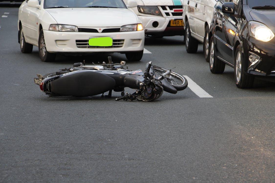 Free Motorcycle Lying on the Road  Stock Photo