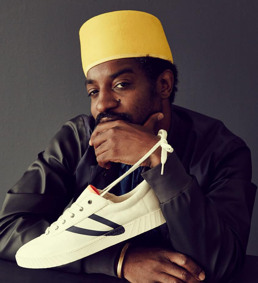 Andre 3000 holding the footwear 