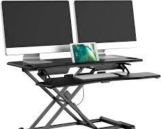 Standing desk converter for remote workers