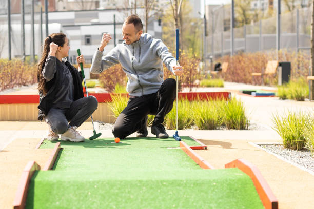 Playing miniature golf together