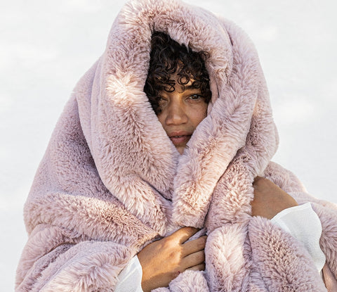 woman wrapped in blanket