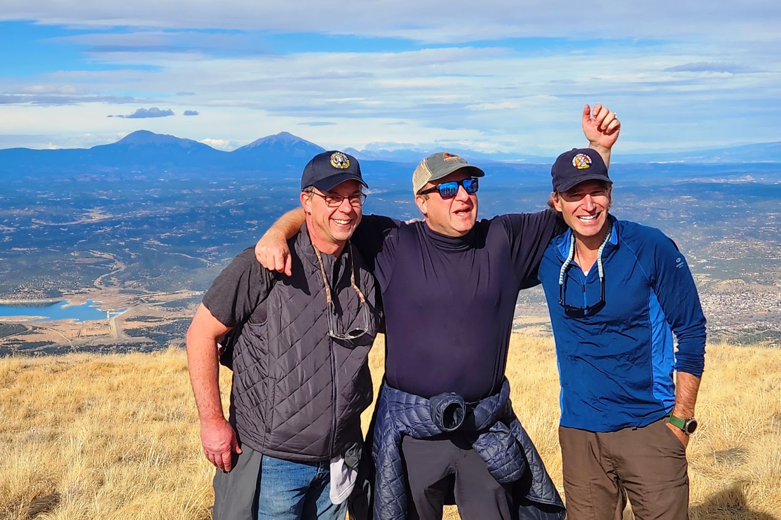 CPW Director Jeff Davis, Governor Jared Polis and DNR Director Dan Gibbs on Fishers Peak Summit trail.