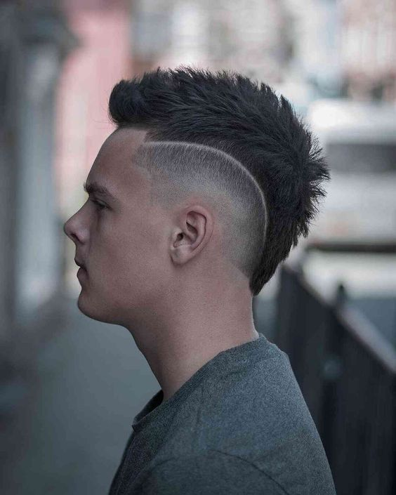 Side view of a guy rocking the mohawk haircut