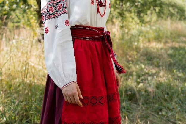 Free photo young adult wearing folk dance costume