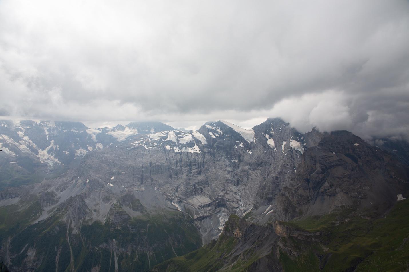 A mountain range with clouds

Description automatically generated