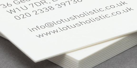 Close-up of a business card

Description automatically generated