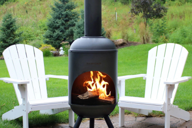 top outdoor heating ideas for your deck or patio chiminea with firewood and adirondack chairs custom built michigan