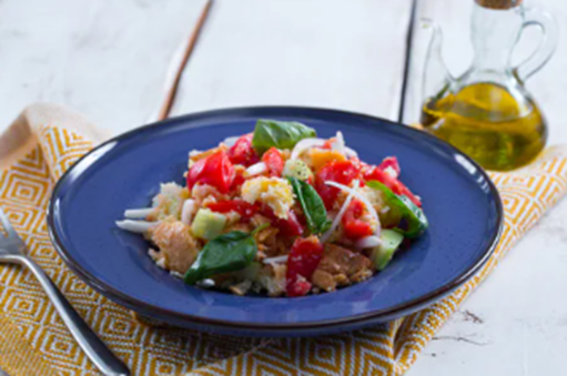 Panzanella: A Tuscan bread salad made with stale bread, tomatoes, onions, cucumbers, and basil, dressed with olive oil and vinegar