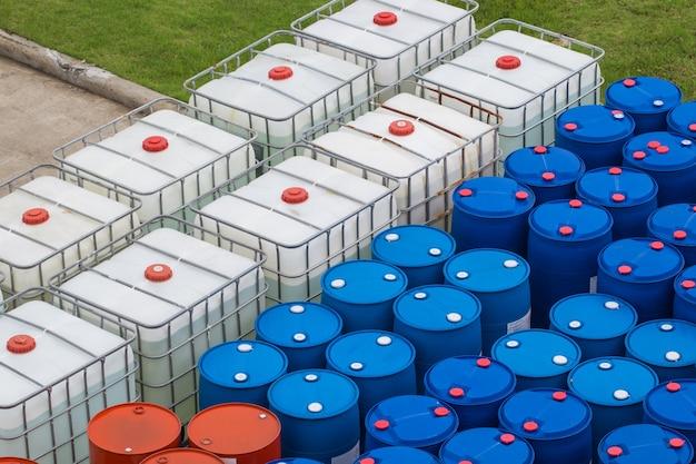 Photo oil barrels blue and white or chemical drums stacked up