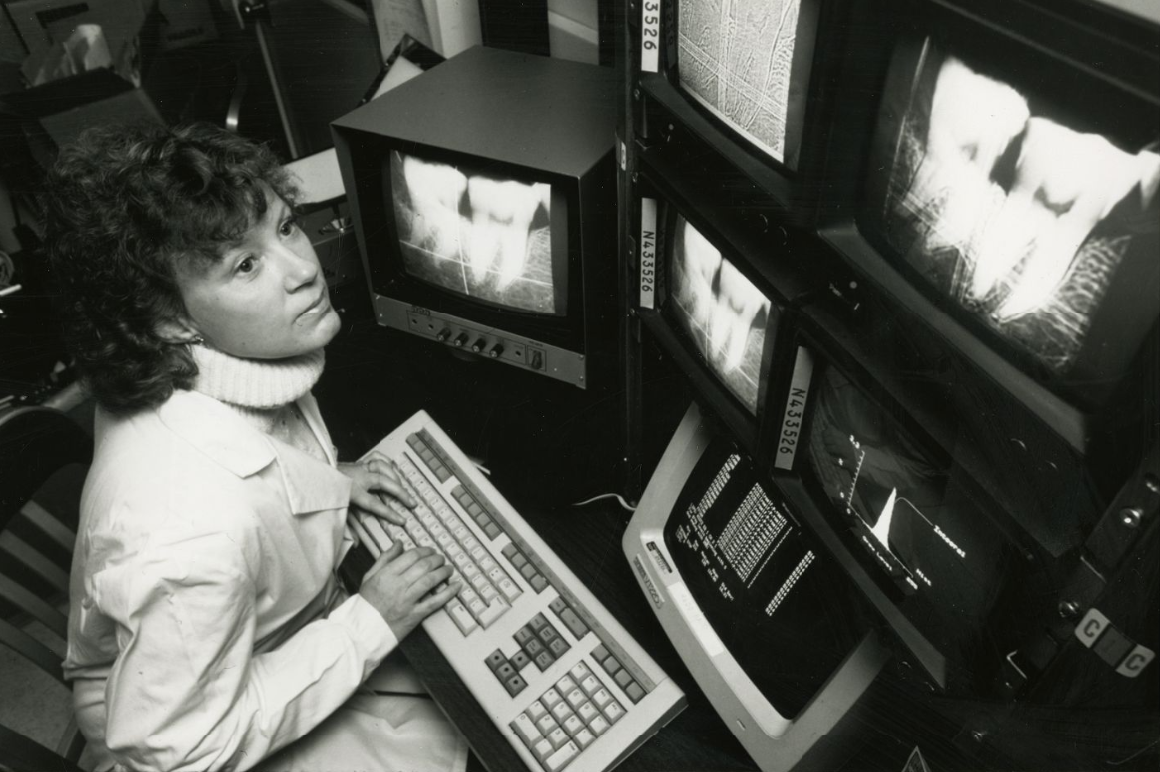 woman typing on a keyboard