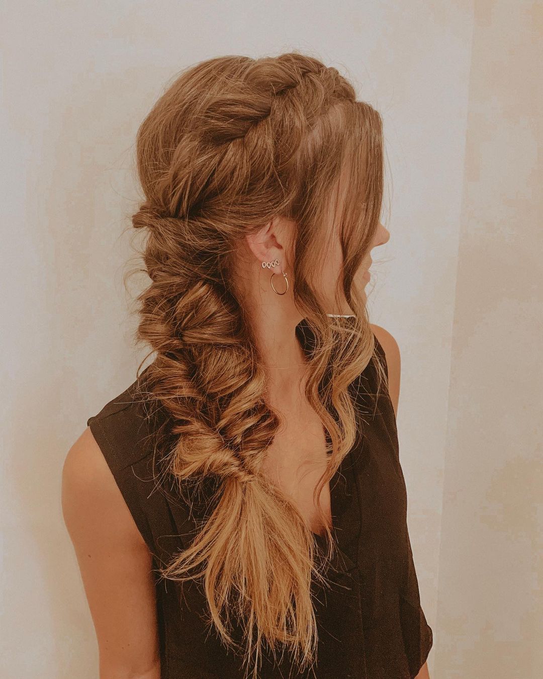 Messy side braid hairstyle