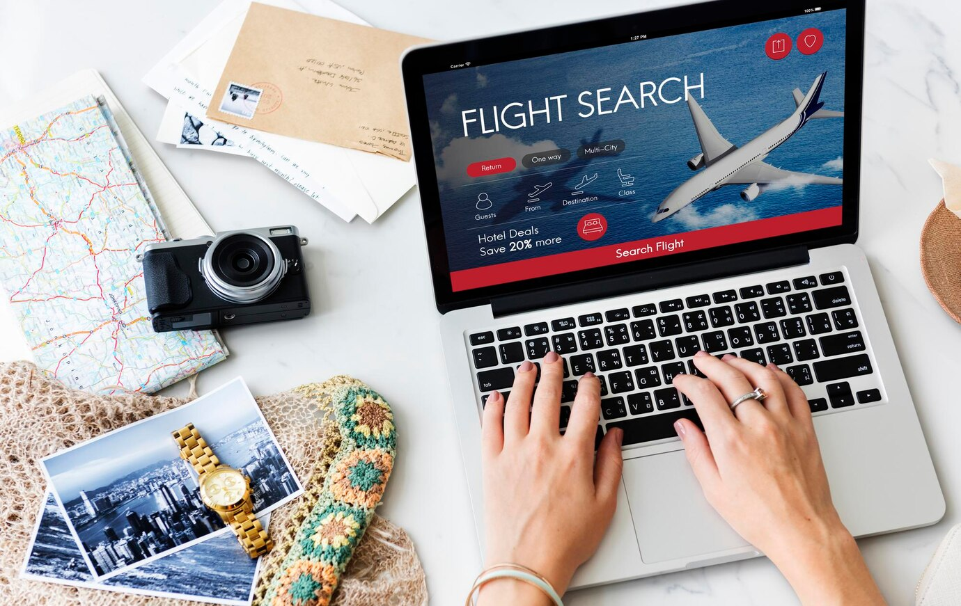 Maximize travel rewards - Traveler searching for flights online.