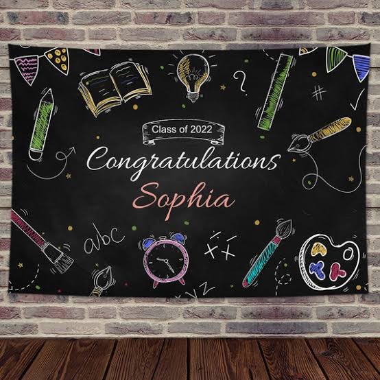 A chalkboard with graduation messages